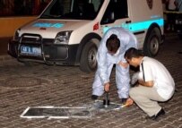 Turkish forensic officers examine blast site in Marmaris on August 28 (epa)