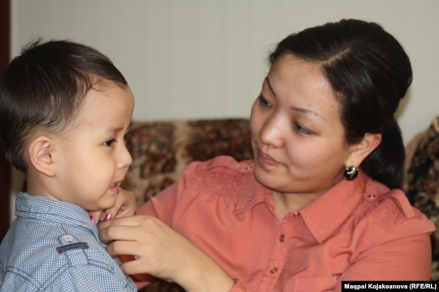 Dinara Qiyalova with her son, Abzal