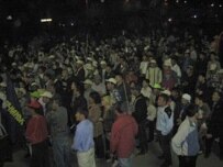 Opposition demonstrators in Bishkek late on April 19 (RFE/RL)