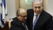 Israel -- Prime Minister Benjamin Netanyahu (R) hugs Meir Dagan, the outgoing director of Israel's spy agency Mossad, after thanking him at the beginning of the weekly cabinet meeting in Jerusalem, 02Jan2011