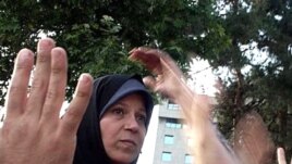 Faezeh Hashemi attends a pro-Musavi rally after the June 2009 presidential election in Tehran.