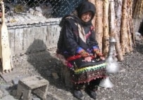 Mirzalay outside of her home in October (RFE/RL)