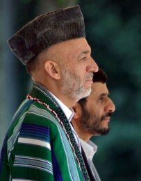 Afghan President Hamid Karzai (left), with his Iranian counterpart Mahmud Ahmadinejad in May 2006, has consistently emphasized Iranian-Afghan friendship (AFP)