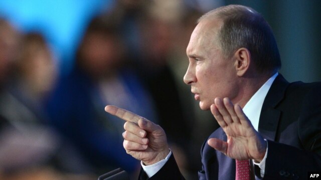 President Vladimir Putin speaks at his annual press conference in Moscow on December 20