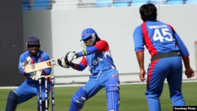A U.S. batsman takes a swing in a qualifier against Afghanistan, won by the Afghans, in Dubai on February 11 for the Twenty20 World Cup. (photo International Cricket Council)
