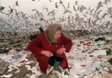 Russia – Reforms / poverty – An elderly woman searches amongst the rubbish at a dump in St. Petersburg, 12Mar1995