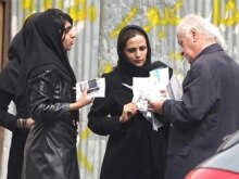 Iran -- Women distribute leaflets for reformist candidates in northwest Tehran, 13Mar2008