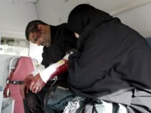 Iraq - An Iraqi wounded pilgrim who was injured in gunmen attack is rushed into local hospital in Baghdad, 30Jan2007