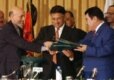 Afghan President Hamid Karzai (left), Pakistani President Pervez Musharraf (center), and Niyazov after the signing of a pipeline agreement in 2002 (CTK)