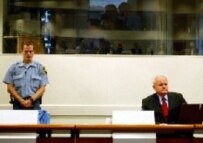Milosevic in the courtroom at The Hague (file photo) (AFP)