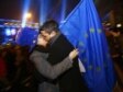 A Romanian couple celebrate in Bucharest as Romania entered the EU in January 2007