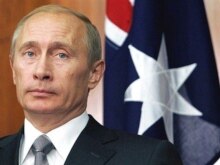 Australia -- Russian President Vladimir Putin looks at a signing of agreement with Australian Prime Minister in Sydney, 07Sep2007
