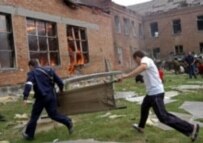 Rescuers entering the school (file photo) (AFP)