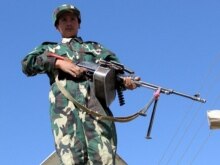 Afghanistan -- Afghan National Army soldier stands guard at Pakistan-Afghanistan border in Spin Boldak, 13Mar2007