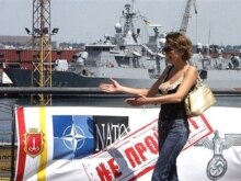 Ukraine -- An anti-NATO placard in front of one of the NATO ship at Odessa port, 08Jul2007