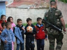Kosovo - A French KFOR peacekeeper patrols the Albanian dominated southern part of the ethnic divided Kosovo town of Mitrovica, 25Apr2007