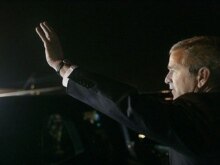Brazil --  US President George W. Bush waves upon arrival at Guarulhos International Airport aboard Air Force One in Sao Paulo, 08Mar2007