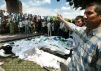 The bodies of victims of the violence in Andijon (file photo) (AFP)