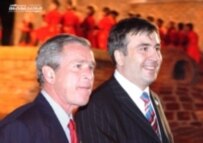 Bush (left) with Saakashvili on a visit to Georgia in May 2005 (RFE/RL)