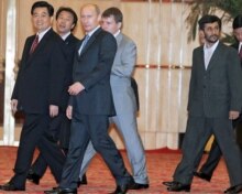 China -- Chinese President Hu Jintao, Russian President Vladimir Putin and Iranian President Mahmud Ahmadinejad arrive for the Shanghai Cooperation Organization (SCO) summit, Shanghai, 15Jun2006