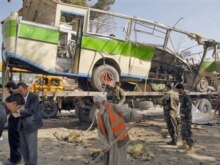 Afghanistan - Afghan municipality workers clean at the site of a suicide attack in Kabul, 02Oct2007