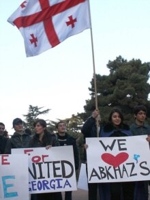 Georgia -- Georgian students hold Georgian flags and placards during a protest against parliamentary elections in the Georgian autonomic republic of Abkhazia in Tbilisi Georgia, 03Mar2007