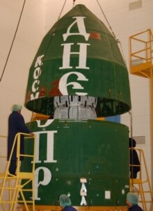 Russia -- American technicians assembling the third stage of the Russian modified Satan missile, also known as the Dnepr, Yasny, 12Jul2006