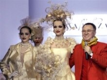 Russia -- fashion designer Vyacheslav (Slava) Zaitsev on the runway, 28Mar2004