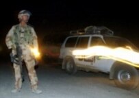 Soldiers on alert following a suicide attack in Kabul on 28 September 2005 (AFP)