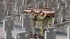 Пахаваньне ўкраінскіх вайскоўцаў, якія загінулі падчас уварваньня Расеі ва Ўкраіну. Львоў, 9 сакавіка 2022 