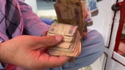 Afghan Banknotes, Like The Economy, Are Crumbling