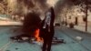 A women chants against the government in a protest in the western Iranian city of Marivan on November 6.