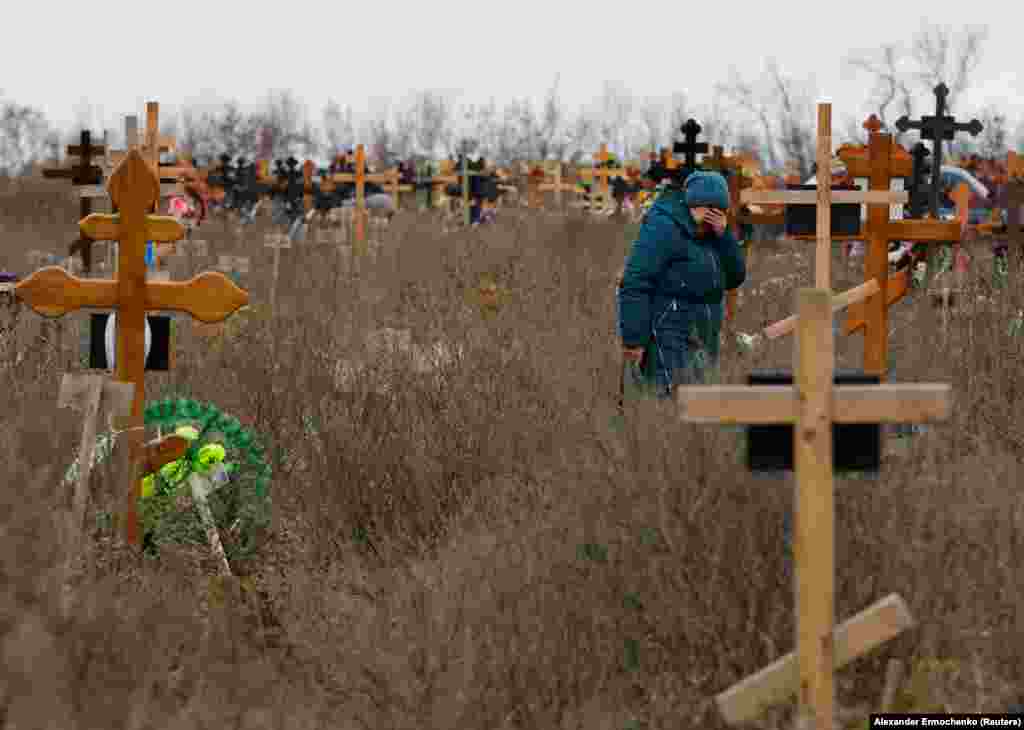 Orfinyak at her granddaughter&rsquo;s grave. &nbsp; According to Orfinyak, 10 people were killed in the mortar explosion, including three children. Veronika, &ldquo;was thrown against the entrance door. She was wounded and died while we were taking her to the hospital,&rdquo; the bereaved grandmother told Reuters, adding, &ldquo;our son was killed immediately.&quot; &nbsp;