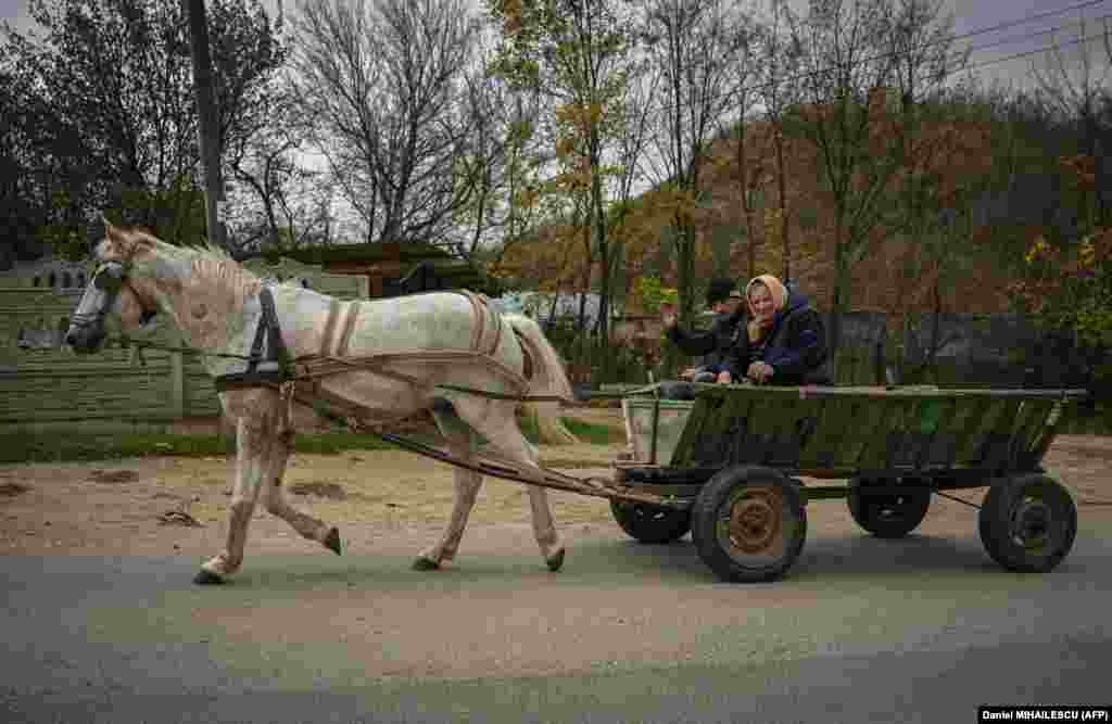 Villagers use a horse and cart in Tibirica on November 2. On October 26, the U.S. Treasury imposed sanctions on a former Moldovan official and several other figures to counter Russia&#39;s &quot;persistent malign influence campaigns and systemic corruption in Moldova.&quot; &nbsp;