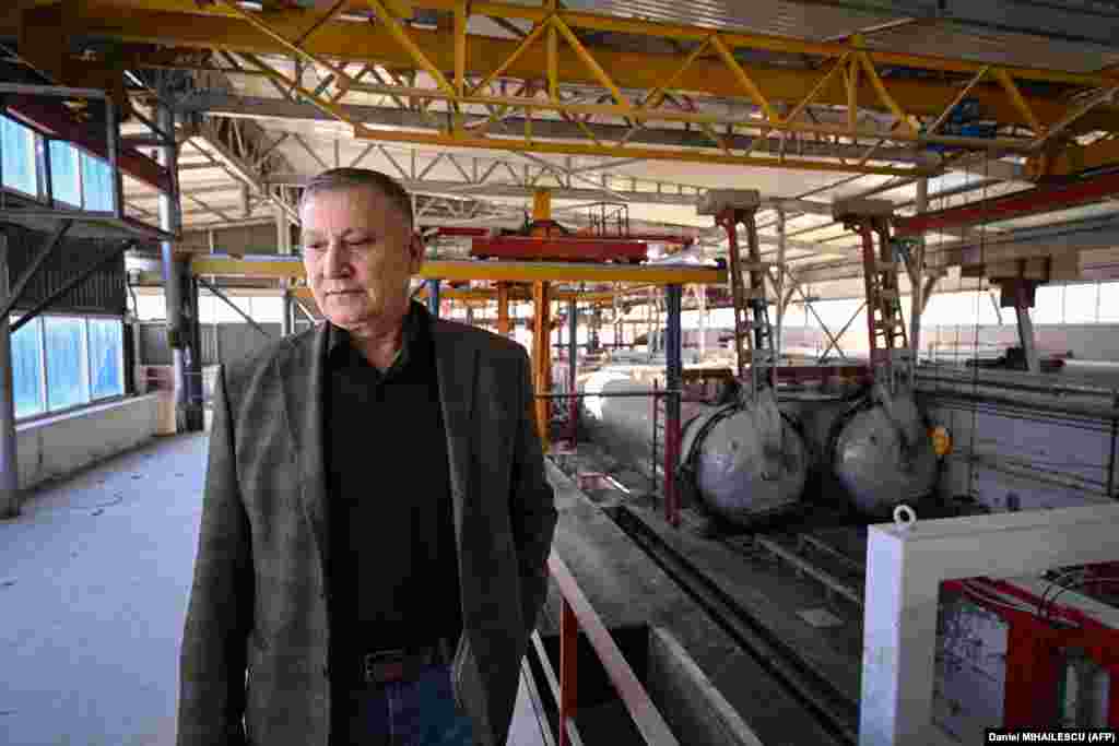 Ion Ignat, the founder and director of the company producing building materials, contemplates his future at the idled&nbsp;factory that previously employed 50 workers. &nbsp;