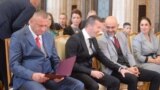 Serbia - Belgrade - Serbian President Aleksandar Vucic presented medals to policemen Nenad Đurić and Aleksandar Filipović from the north of Kosovo who refused to implement the decision of the government of Kosovo on the re-registration of car plates