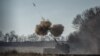 Ukrainian soldiers fire a Polish self-propelled Krab howitzer toward Russian positions in the Donetsk region on November 8.