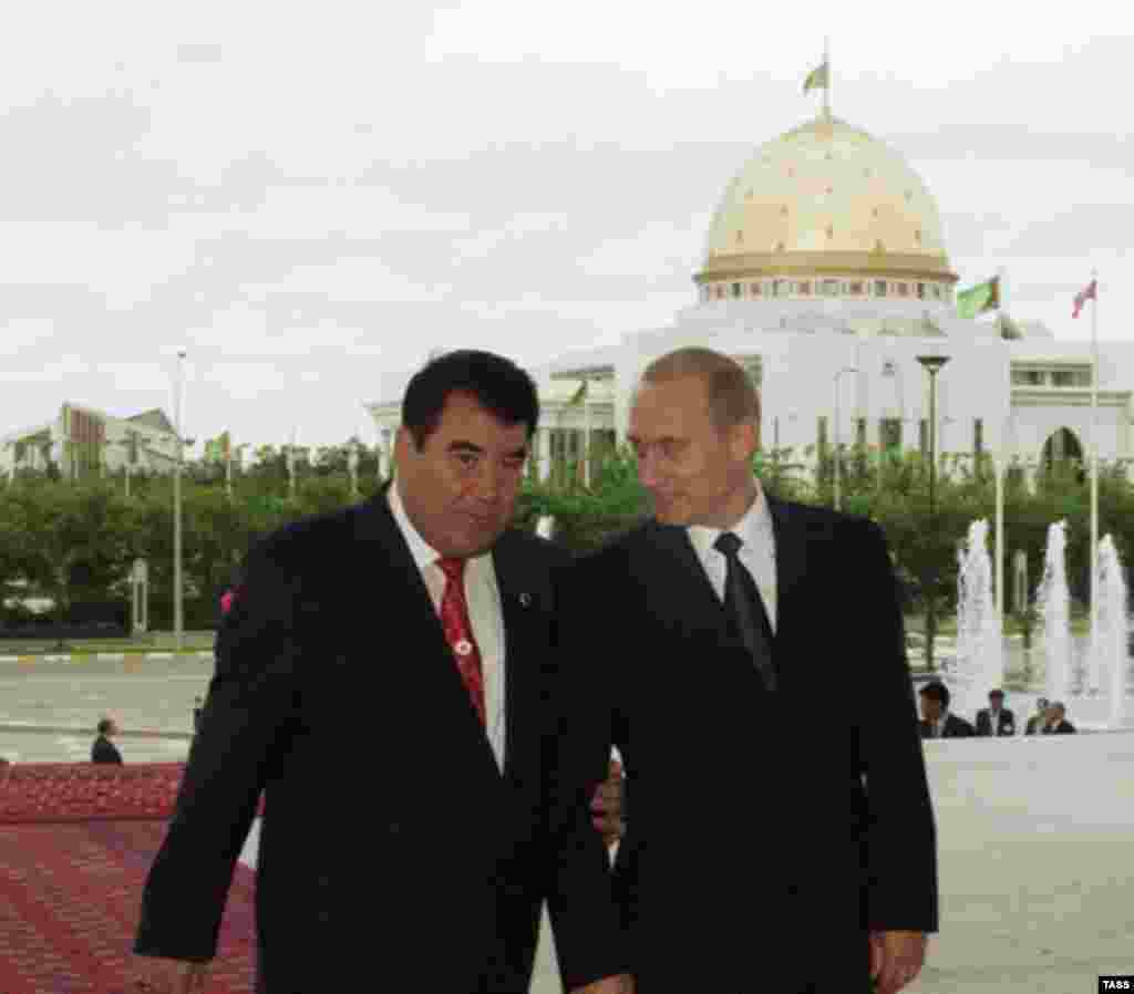 Russian President Vladimir Putin (right) with President Niyazov in Ashgabat, in April 2002 (TASS) - Niyazov enjoyed close relations with Russian President Vladimir Putin, although the two countries sometimes held tense negotiations over natural-gas prices and dual-citizenship issues. In August 2005, Turkmenistan downgraded its membership in the Russian-led Commonwealth of Independent States to observer status.