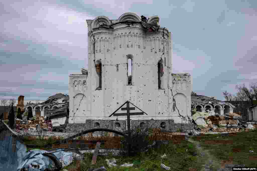 The shrapnel-pocked rear walls of the monastery. Since a 2018 schism, Ukraine&#39;s church leadership was split between those that maintained allegiance to the Moscow patriarchate and those who joined a new Ukrainian church.&nbsp; &nbsp;