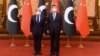 Pakistan's Prime Minister Shehbaz Sharif (left) meets Chinese President Xi Jinping in Beijing on November 2.