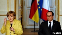 Angela Merkel və Francois Hollande 