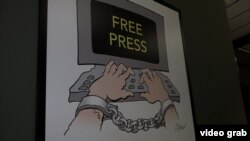 Karikatura Predraga Koraksića Coraxa u listu Danas koja govori o slobodi medija, novembar, 2022