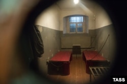 Looking through the peep hole at NKVD Pre-Trial Jail, a memorial museum of political repression