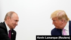 U.S. President Donald Trump (right) meets with his Russian counterpart, Vladimir Putin, in Japan in 2019.