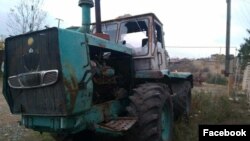 A tractor that ethnic Armenian authorities in Stepanakert say was damaged when Azerbaijani forces opened fire at farmers working in the field near the village of Khramort in the east of Nagorno-Karabakh. November 12, 2022.