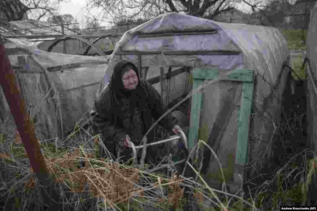 Olha Lehan, 71, who lives in Demydiv, is facing an uncertain future in a moldy house without access to clean water and a garden that is ruined. &nbsp;