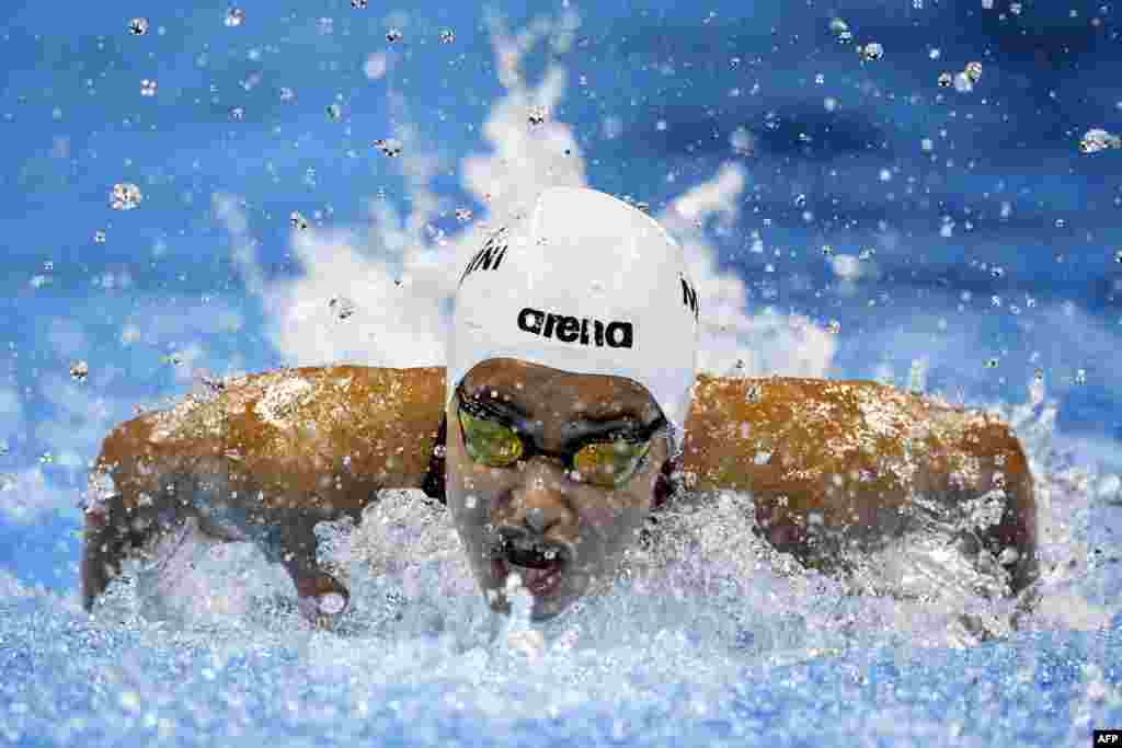 The Refugee Olympic Team&#39;s Yusra Mardini takes part in the Women&#39;s 100-meter butterfly heat during the swimming event at the Rio 2016 Olympic Games at the Olympic Aquatics Stadium in Rio de Janeiro on August 6. (AFP/Martin Bureau)