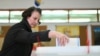  A woman casts her ballots in local elections in Bosnia-Herzegovina on October 6. 