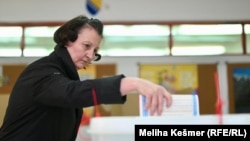  A woman casts her ballots in local elections in Bosnia-Herzegovina on October 6. 