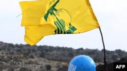  Lebanese village of Meiss al-Jabal on December 16, 2018, shows a United Nations Interim Forces in Lebanon (UNIFIL) soldier monitoring the border between Lebanon and Israel. 